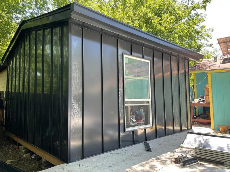 Black standing seam metal wall panels for Metal Roof Installation in Kahaluu